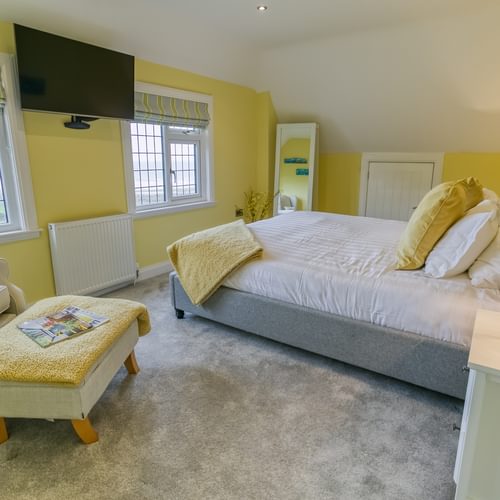Gwynaeth Gwyn Llanddona Anglesey yellow bedroom to bed 1920x1080