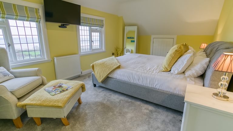 Gwynaeth Gwyn Llanddona Anglesey yellow bedroom to bed 1920x1080