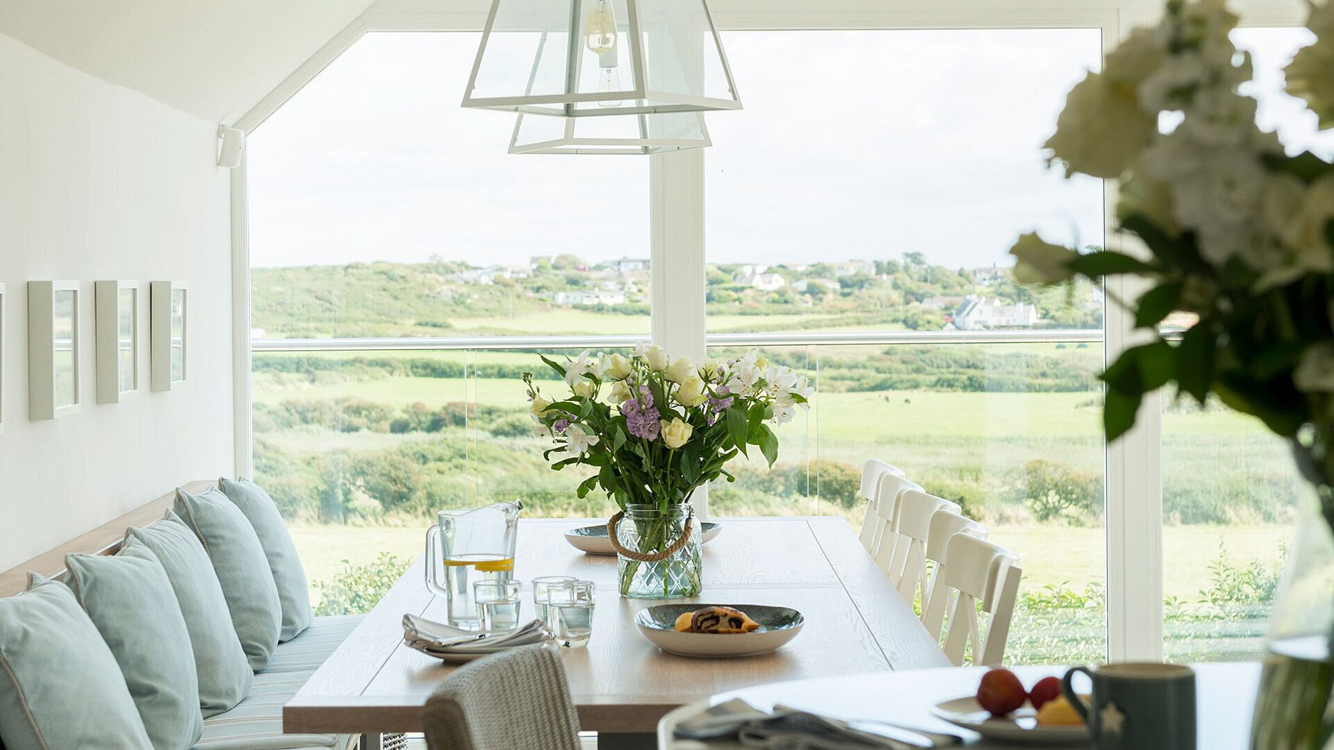 Llain y Brenin Rhoscolyn Anglesey dining table view 2 1920x1080