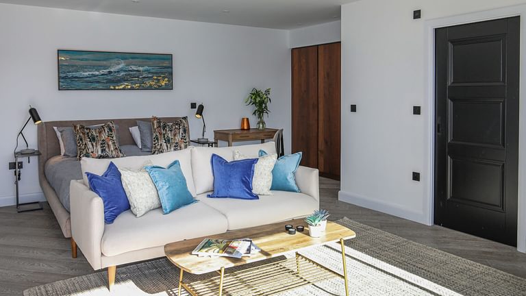 Sandown House Trearddur Bay Anglesey king bedroom sofa 1920x1080