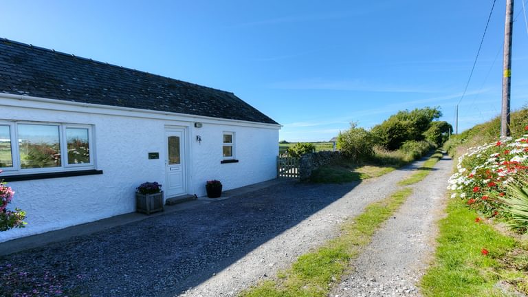 Pandy Cottage Aberffraw outside and lane 1920x1080