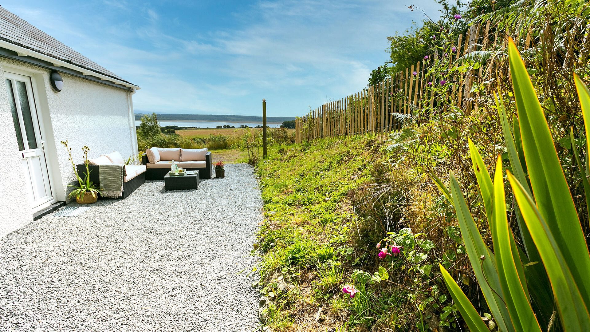 Tan Yr Allt Malltraeth Anglesey exterior sea view 1920x1080