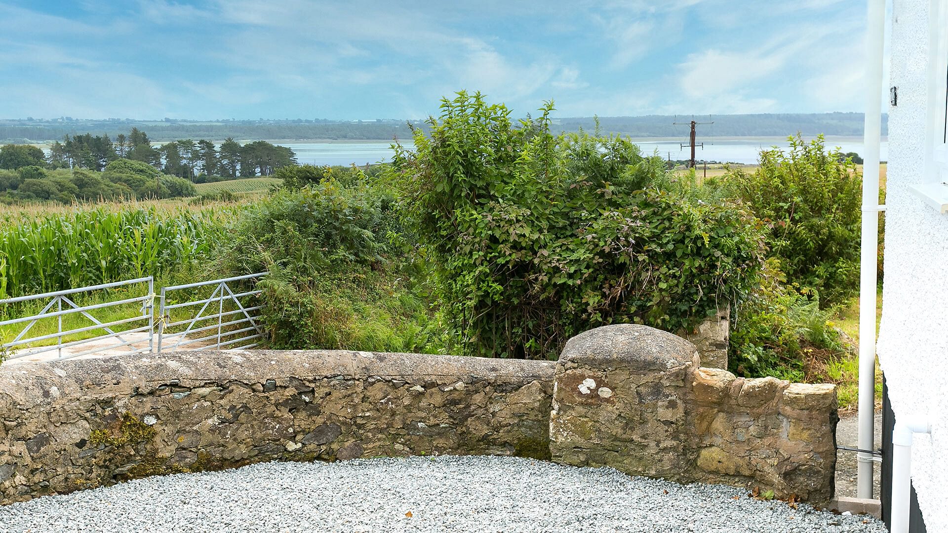 Tan Yr Allt Malltraeth Anglesey exterior sea view 2 1920x1080