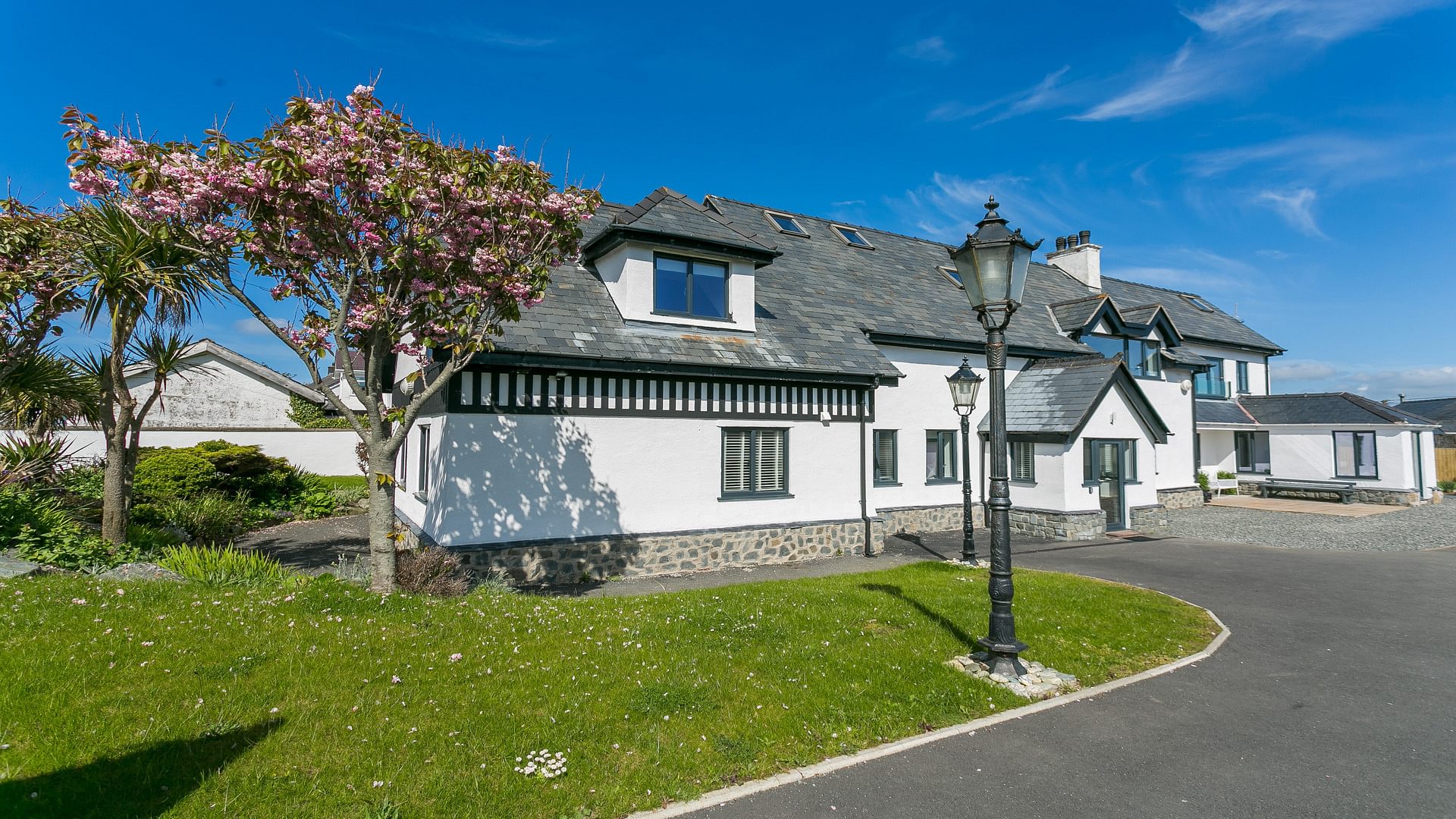 The Old Abbey Ravenspoint Road Trearddur Bay LL65 2 YU cherry blossom 1920x1080