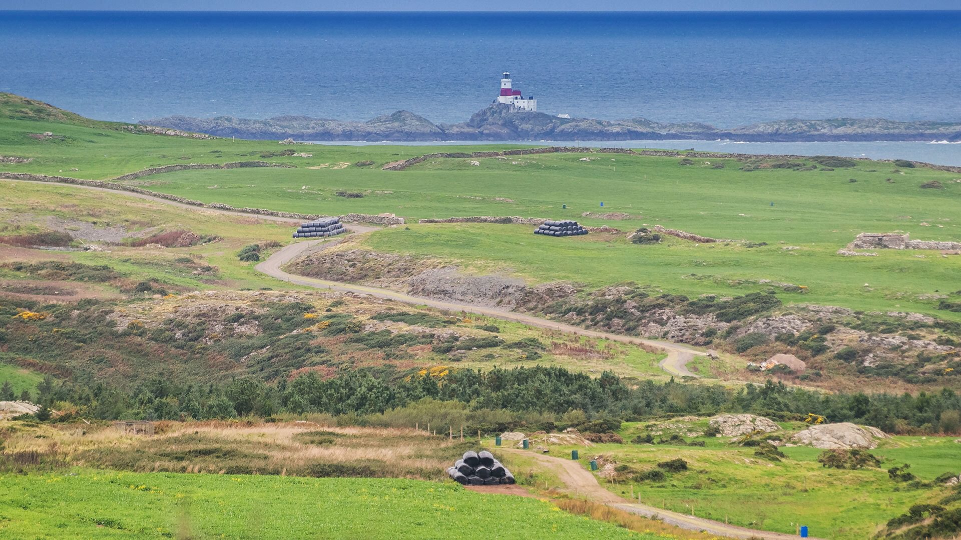 Y Beudy Church Bay Anglesey view over lighthouse 1920x1080